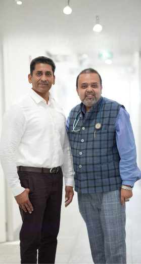 Doctors at Cranbourne West Medical Centre reception greeting patients